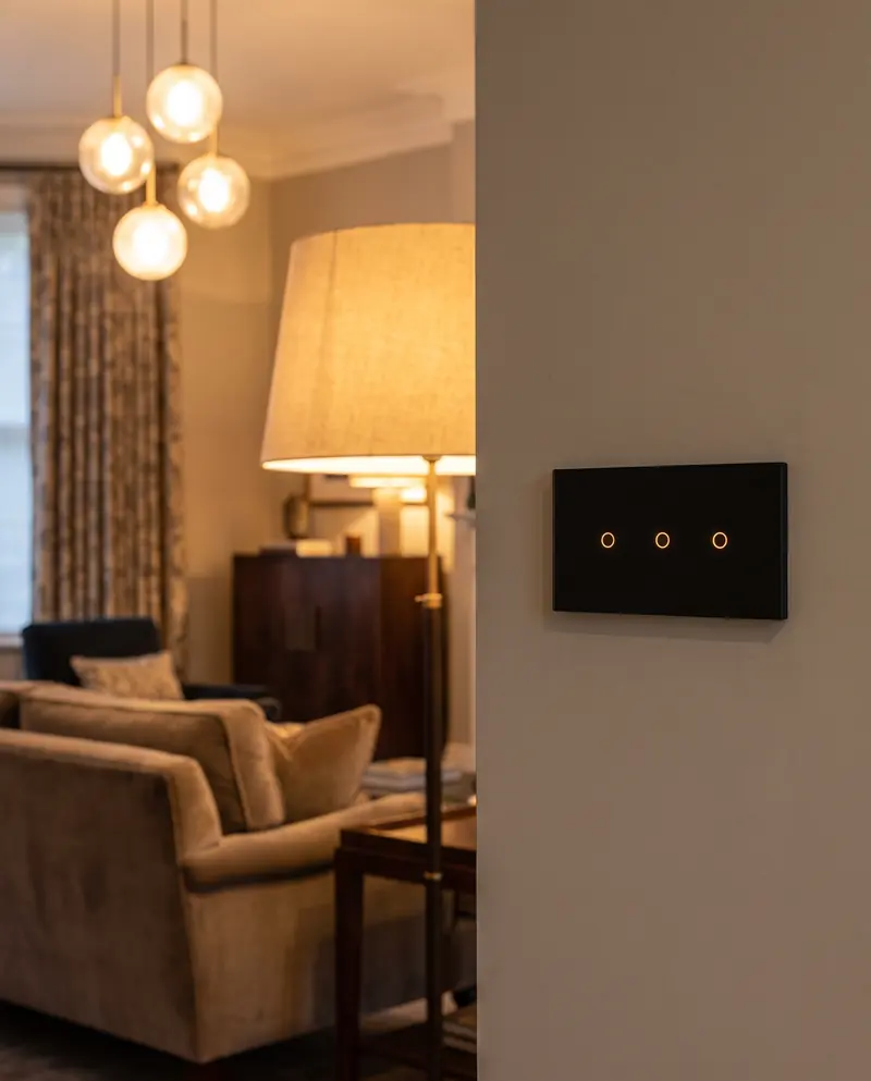 A smart light switch in a living room